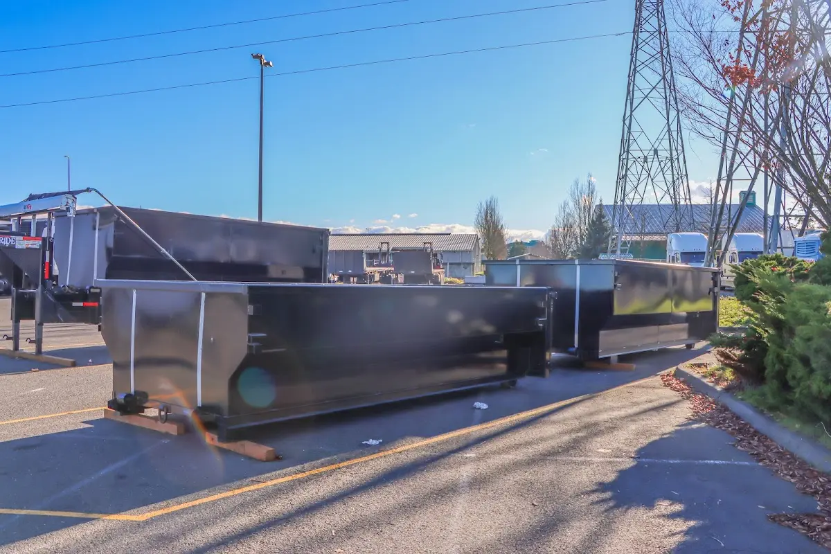 Roll-off dumpster ready for waste disposal at job site for Yard Waste Dumpster Rental in Weymouth Town